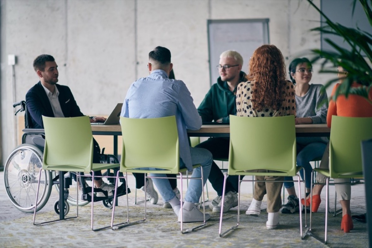 Diverse team at an inclusive workplace meeting